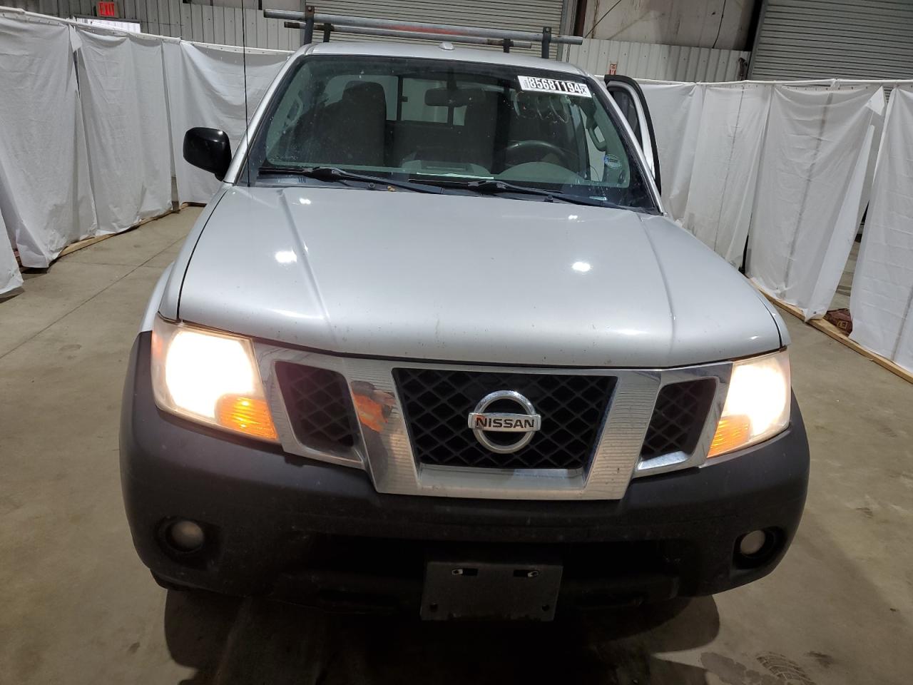 2014 Nissan Navara (Frontier) VIN 1N6AD0EV5EN757822 Copart auction photo, side / front end damage thumbnail 5