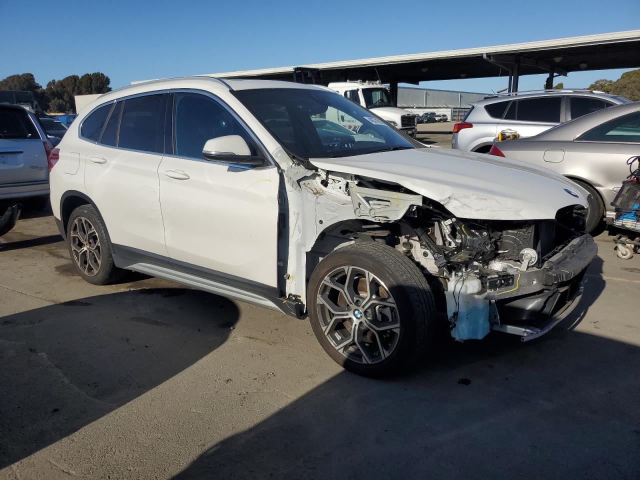 2021 BMW X1 VIN WBXJG9C09M5S71263 Copart auction photo, front end damage thumbnail 4