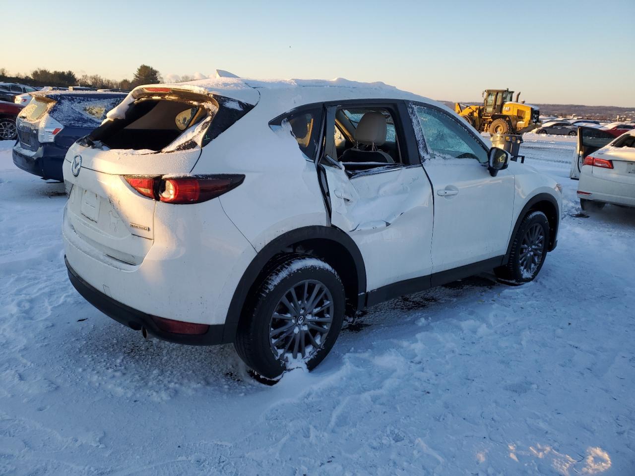 2021 Mazda CX-5 VIN JM3KFBCM3M0475706 Copart auction photo, side / top/roof damage thumbnail 3