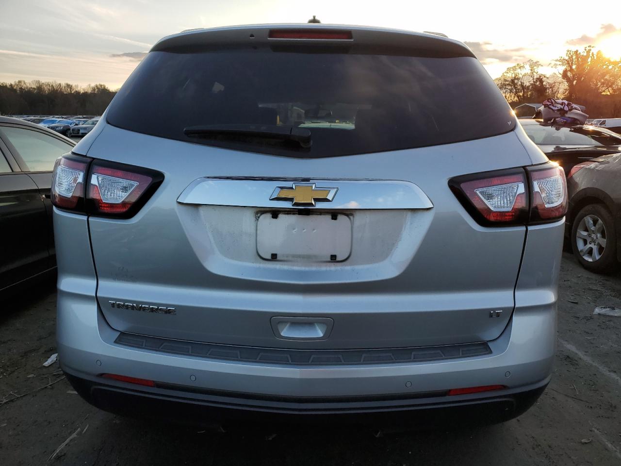 2017 Chevrolet Traverse VIN 1GNKRGKD1HJ101486 Copart auction photo, side / minor dent/scratches damage thumbnail 6