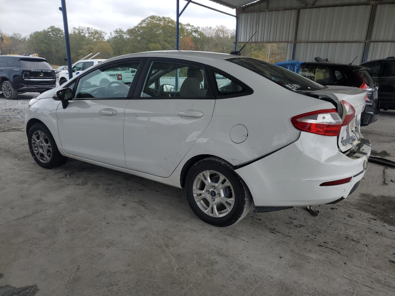 2016 Ford Fiesta VIN 3FADP4BJXGM202903 Copart auction photo, rear end / minor dent/scratches damage thumbnail 2