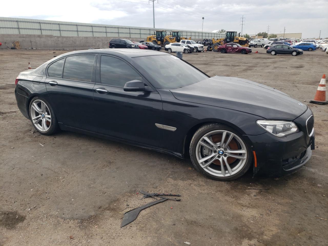 2014 BMW 7er VIN WBAYA8C59ED825179 Copart auction photo, all over damage thumbnail 4