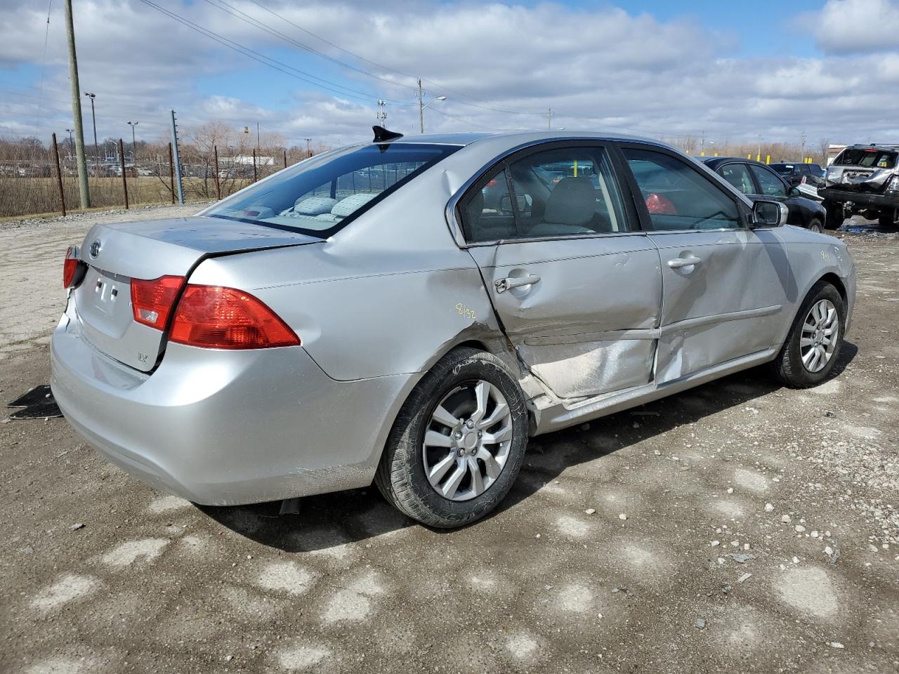 2009 KIA Optima VIN KNAGE228095291403 Copart auction photo, side / rear end damage thumbnail 3