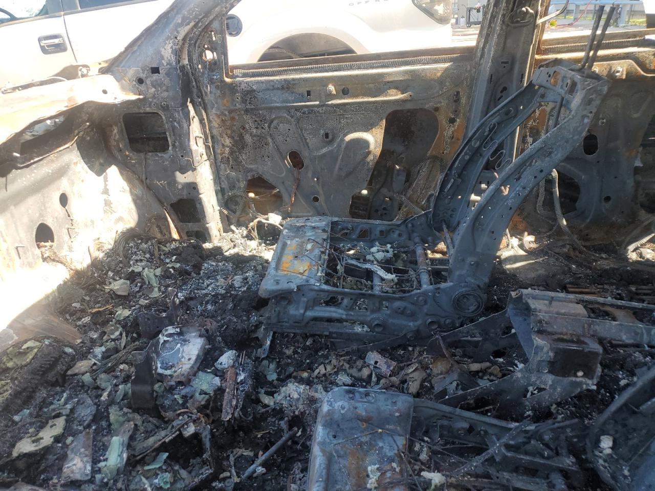 2013 Chevrolet Traverse VIN 1GNKRGKD1DJ130724 Copart auction photo, burn damage thumbnail 7
