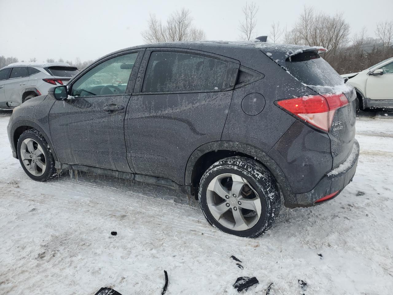 2017 Honda HR-V VIN 3CZRU6H56HG709693 Copart auction photo, undercarriage damage thumbnail 2