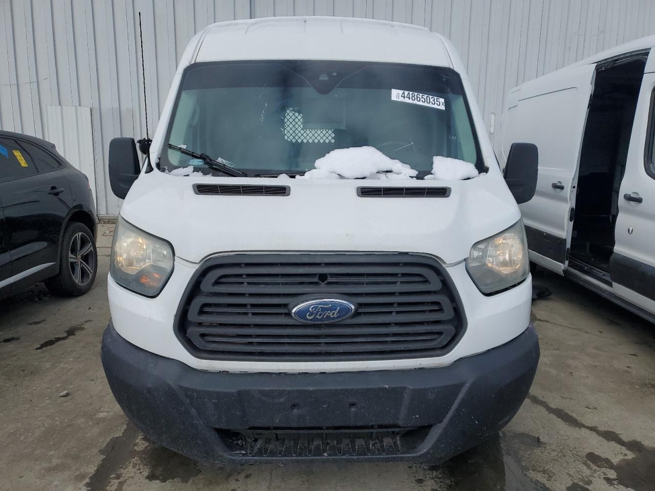 2015 Ford Transit VIN 1FTCR2CMXFKA93247 Copart auction photo, normal wear / minor dent/scratches damage thumbnail 5