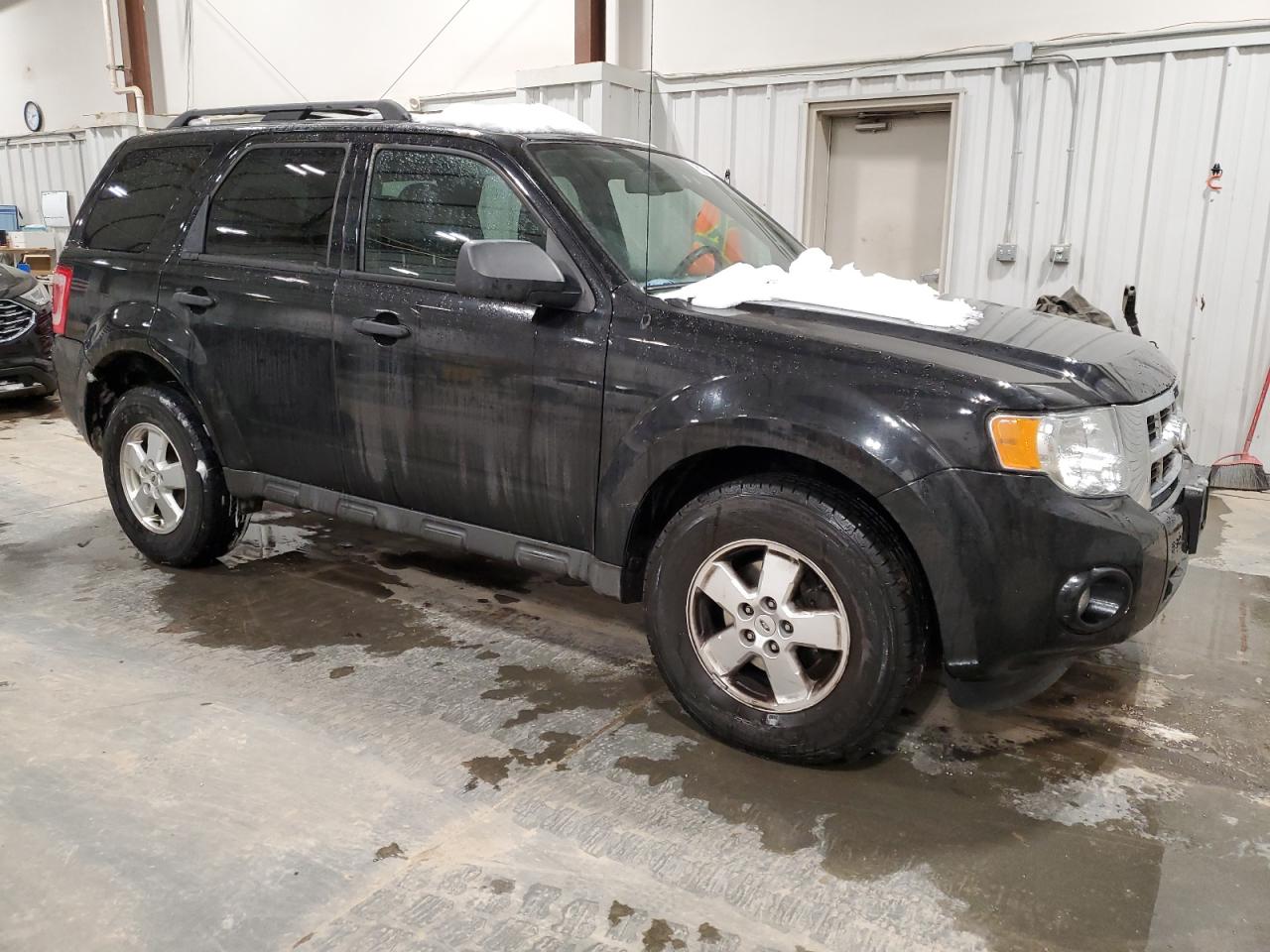 2011 Ford Escape VIN 1FMCU0D73BKA04880 Copart auction photo, front end / minor dent/scratches damage thumbnail 4