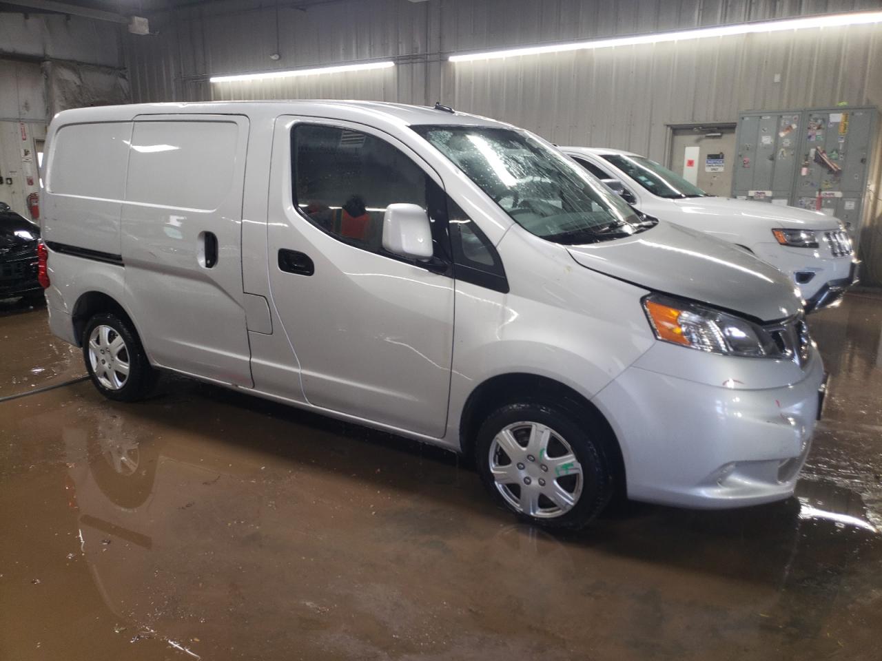 2014 Nissan NV VIN 3N6CM0KN4EK698233 Copart auction photo, side / minor dent/scratches damage thumbnail 4