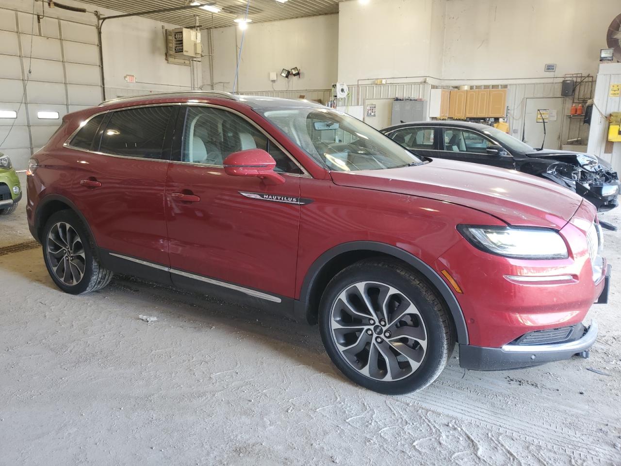 2021 Lincoln Nautilus VIN 2LMPJ6K90MBL16867 Copart auction photo, front end / side damage thumbnail 4