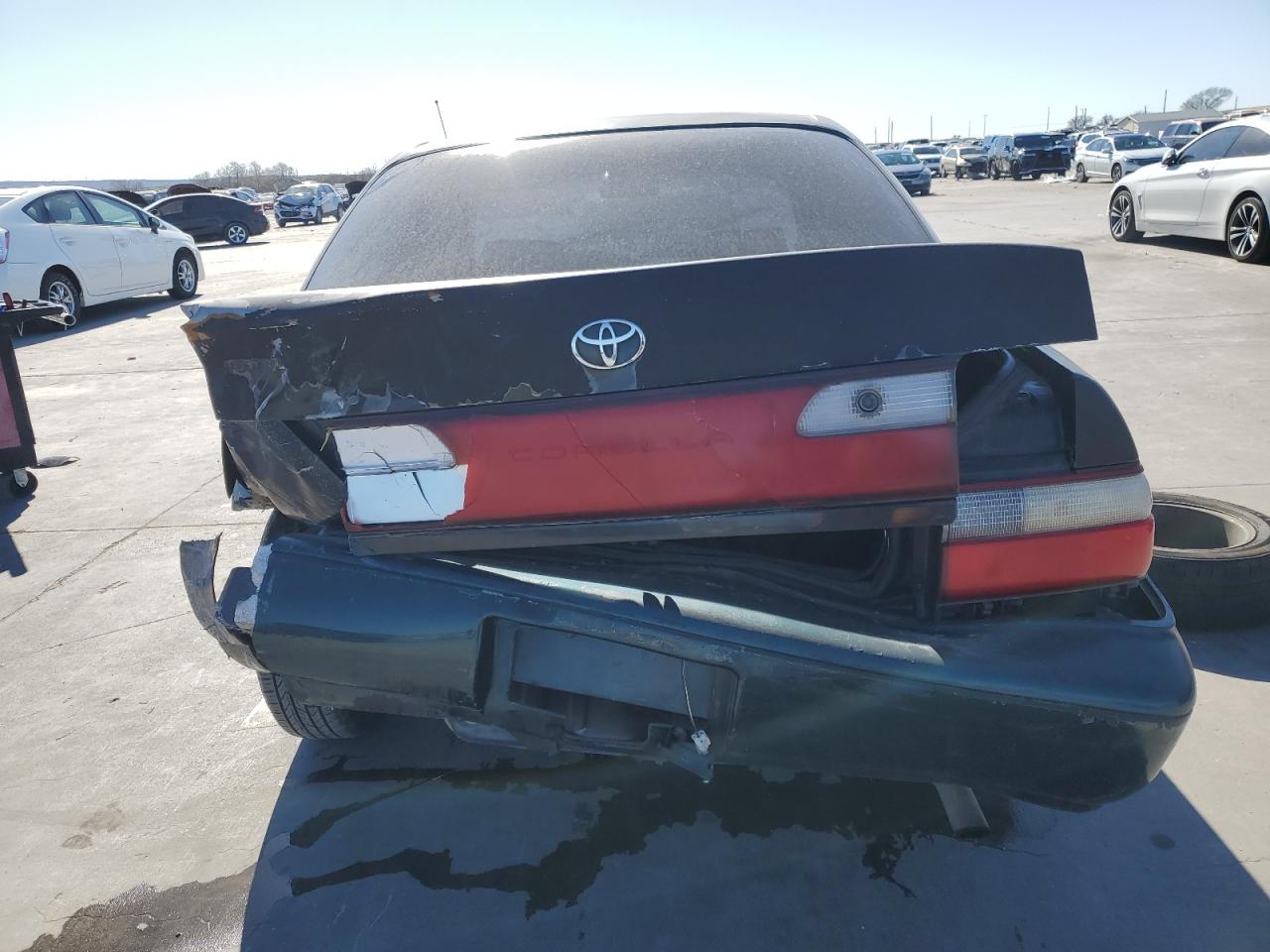 1997 Toyota Corolla VIN 1NXBA02E0VZ614850 Copart auction photo, rear end damage thumbnail 6
