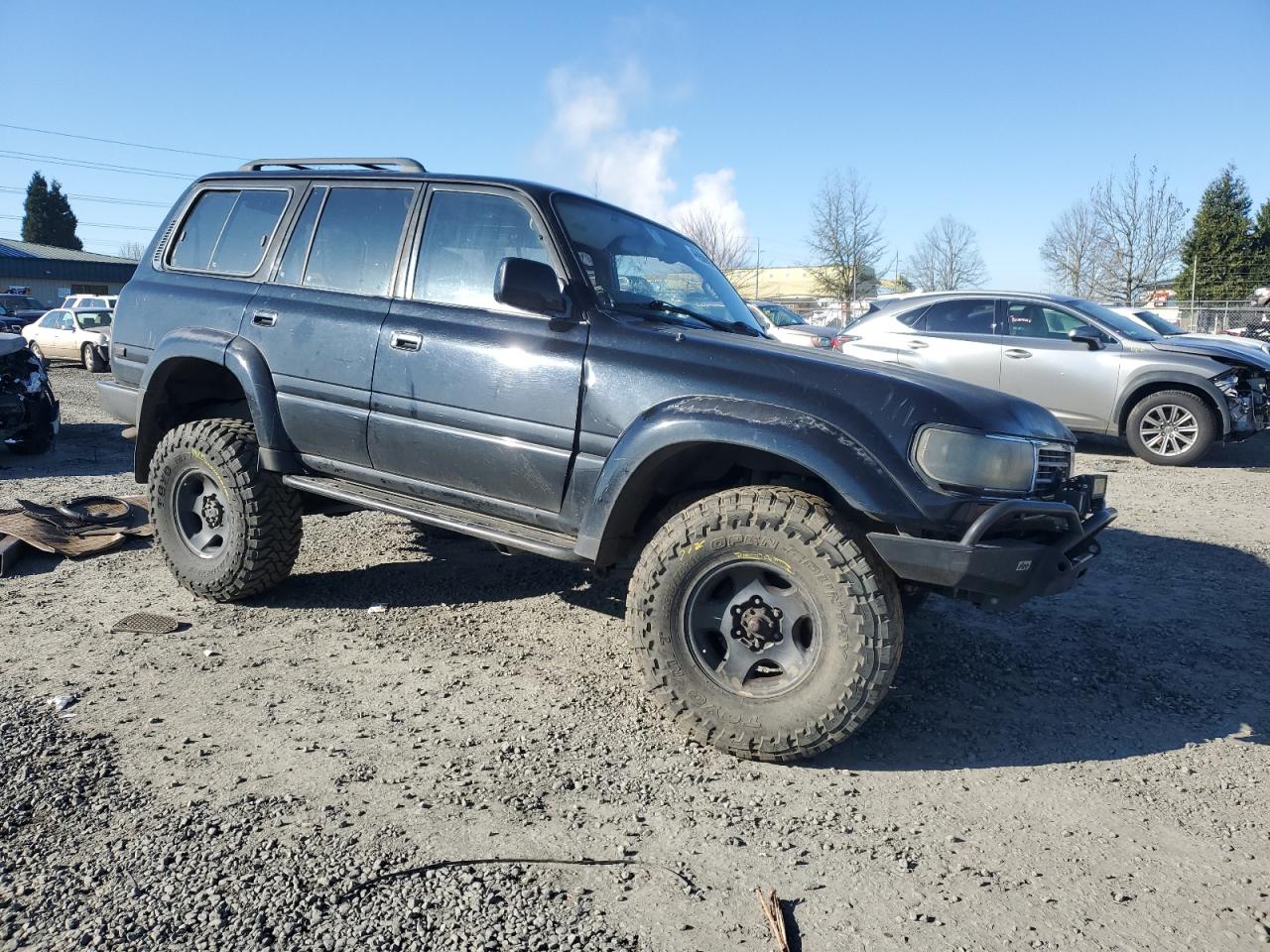 1996 Toyota Land Cruiser VIN JT3HJ85J4T0136821 Copart auction photo, front end damage thumbnail 4