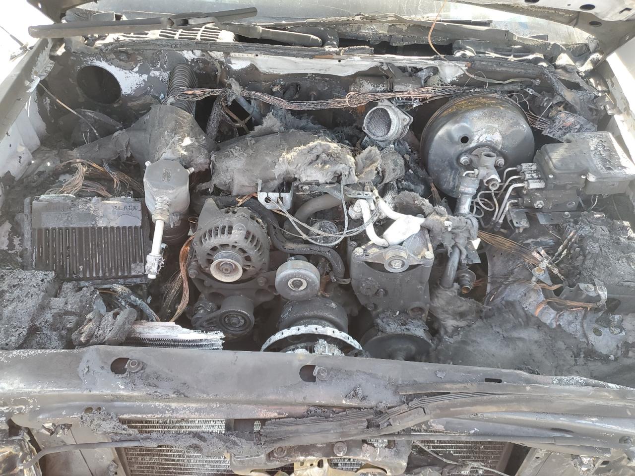 2000 GMC Jimmy VIN 1GKCS13W5Y2349270 Copart auction photo, burn damage thumbnail 11