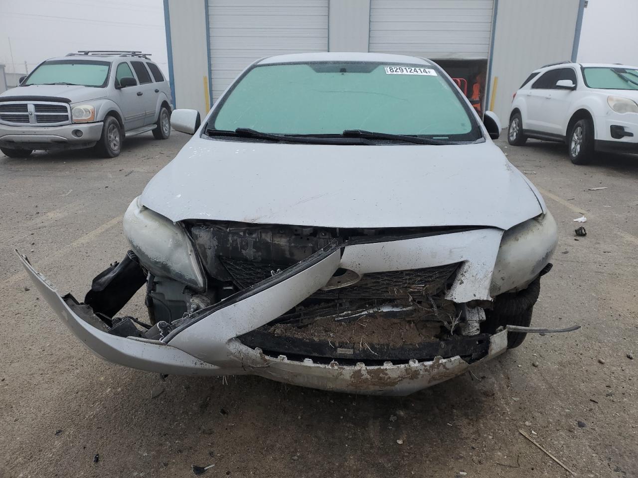 2009 Toyota Corolla VIN 1NXBU40E09Z123069 Copart auction photo, front end / rear end damage thumbnail 5