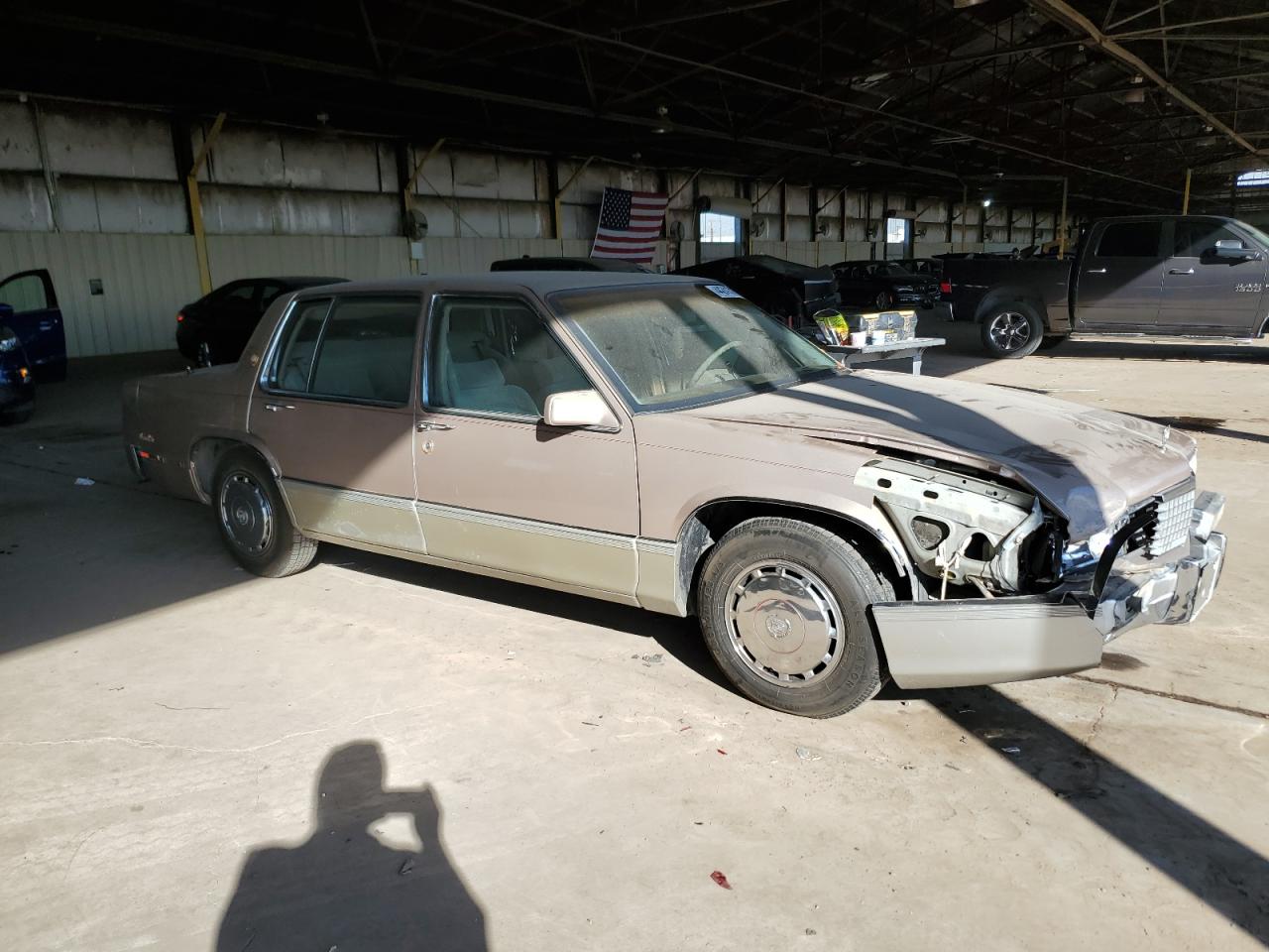1990 Cadillac De Ville VIN 1G6CD5334L4365012 Copart auction photo, front end / side damage thumbnail 4