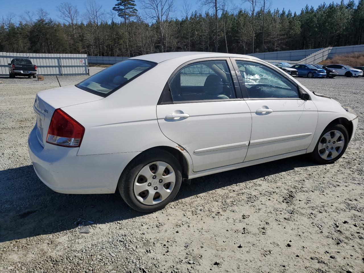 2009 KIA Spectra VIN KNAFE221895630942 Copart auction photo, all over damage thumbnail 3