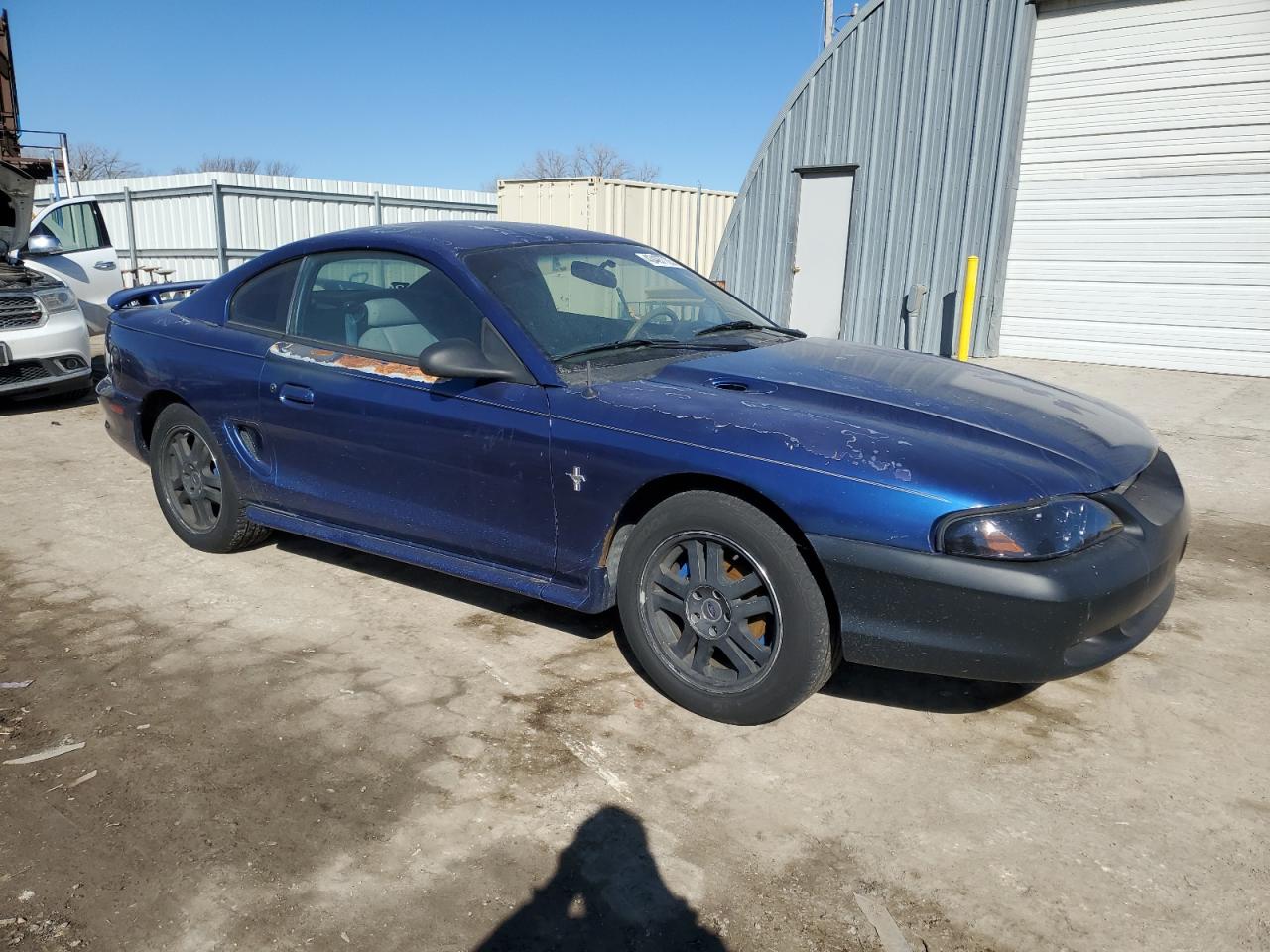 1997 Ford Mustang VIN 1FALP404XVF156625 Copart auction photo, front end / mechanical damage thumbnail 4