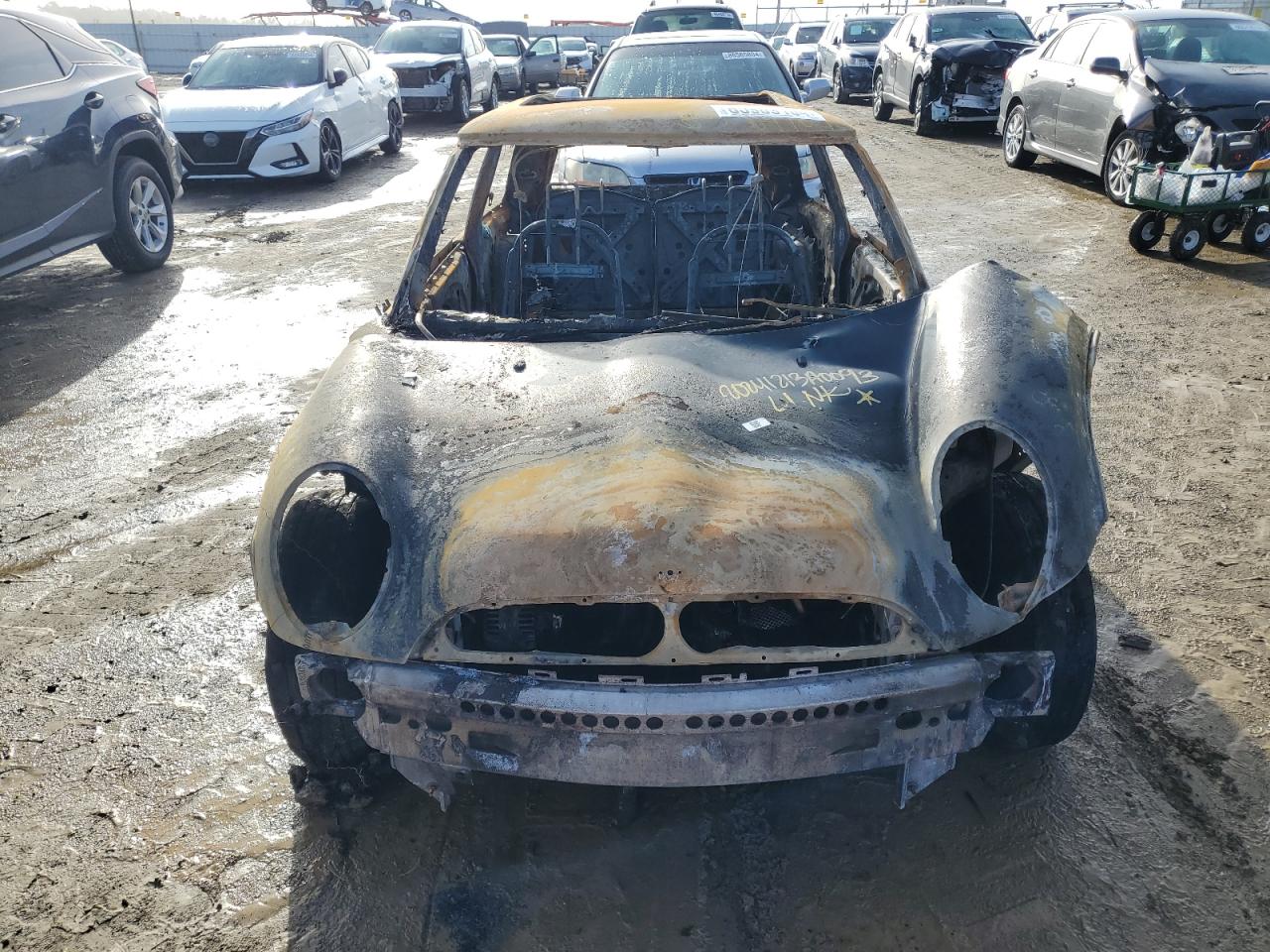 2006 MINI Cooper VIN WMWRC33556TJ75968 Copart auction photo, burn damage thumbnail 5