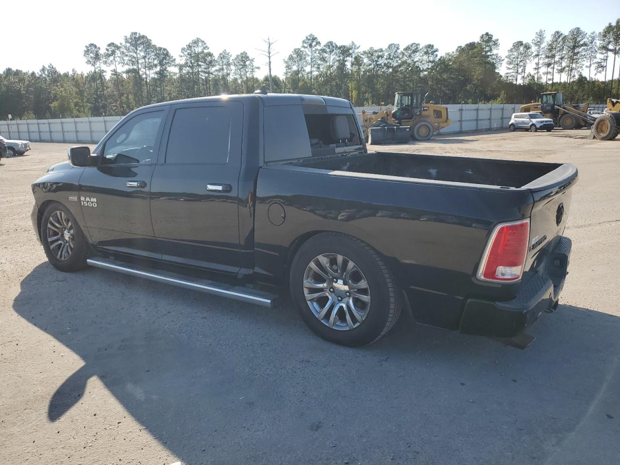 2015 RAM 1500 VIN 1C6RR6PTXFS570463 Copart auction photo, rear end damage thumbnail 2