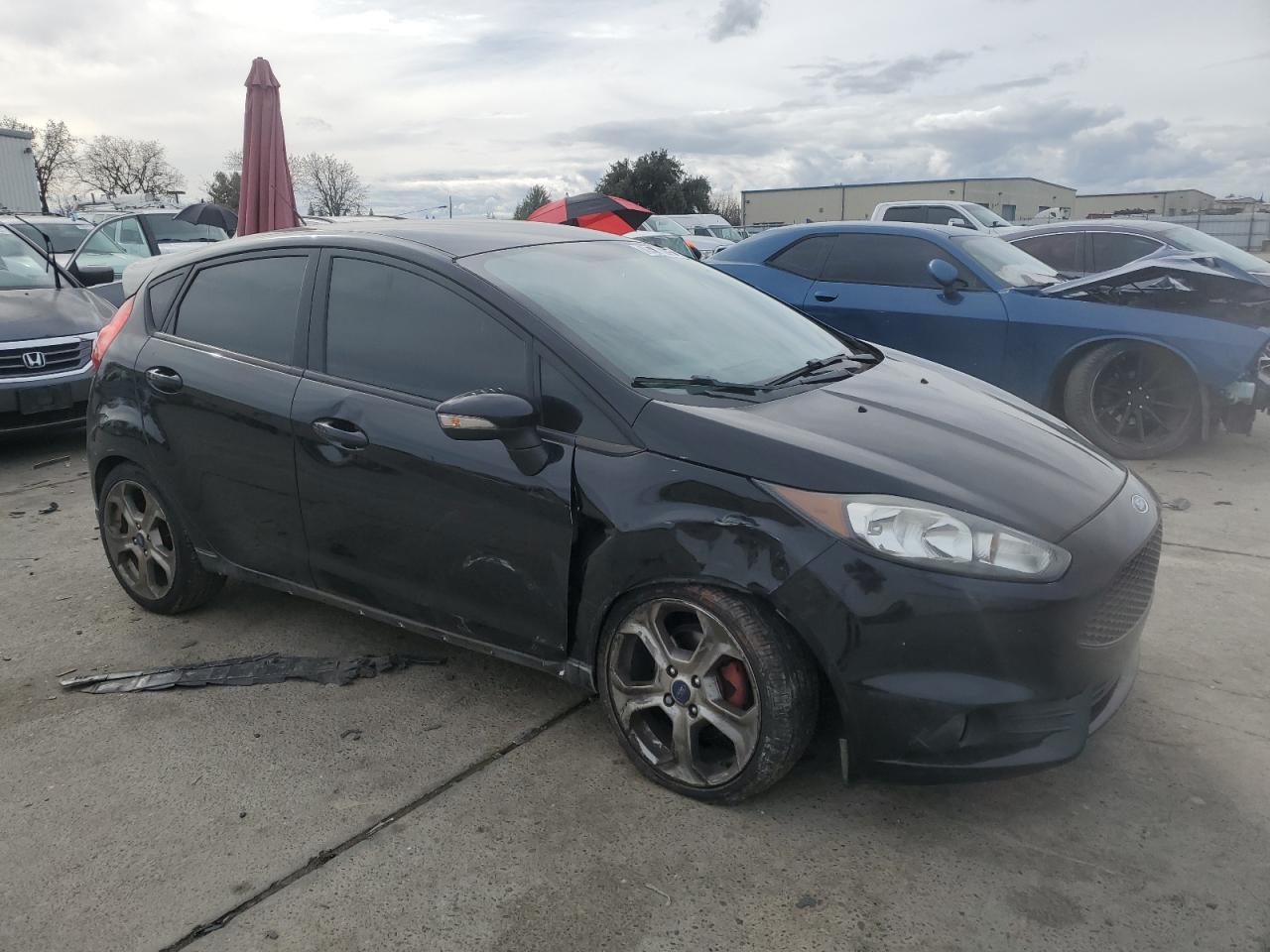 2016 Ford Fiesta VIN 3FADP4GX7GM165340 Copart auction photo, side / front end damage thumbnail 4