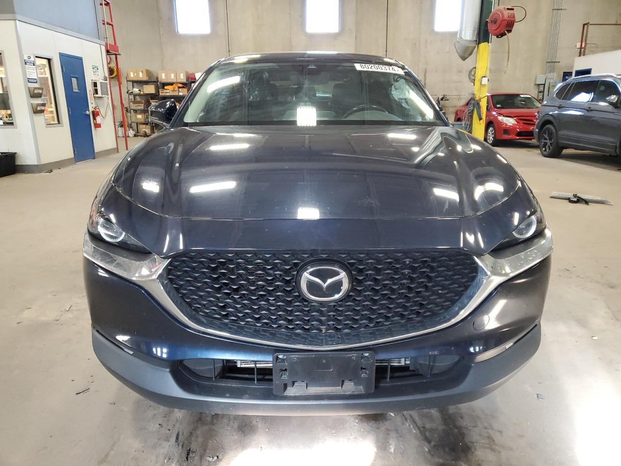 2021 Mazda CX-30 VIN 3MVDMBBL1MM255881 Copart auction photo, side / front end damage thumbnail 5