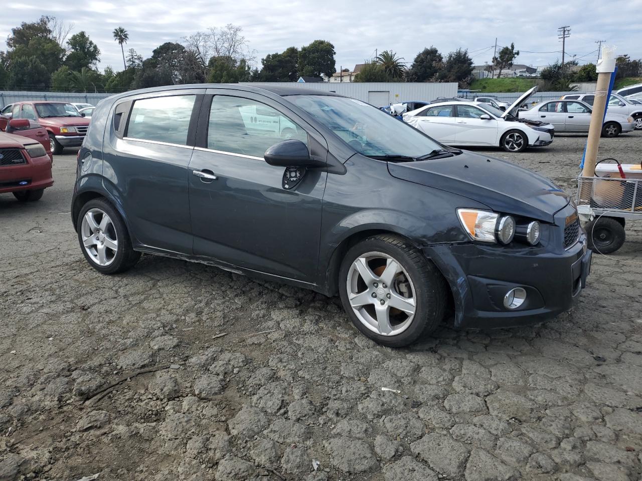2014 Chevrolet Sonic VIN 1G1JE6SBXE4129606 Copart auction photo, front end / all over damage thumbnail 4