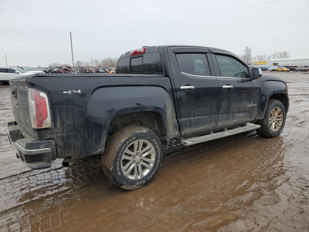 2015 GMC Canyon VIN 1GTG6CE36F1130143 Copart auction photo, side / rear end damage thumbnail 3