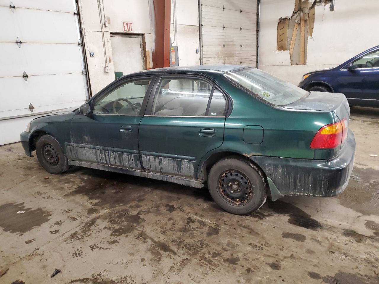 1999 Honda Civic VIN 2HGEJ6611XH594868 Copart auction photo, front end / hail damage thumbnail 2