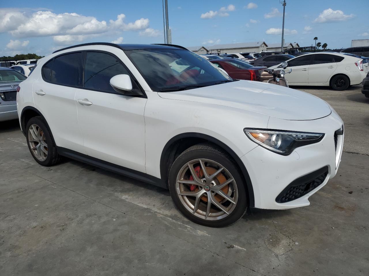 2018 Alfa Romeo Stelvio VIN ZASFAKNNXJ7B89294 Copart auction photo, water/flood damage thumbnail 4