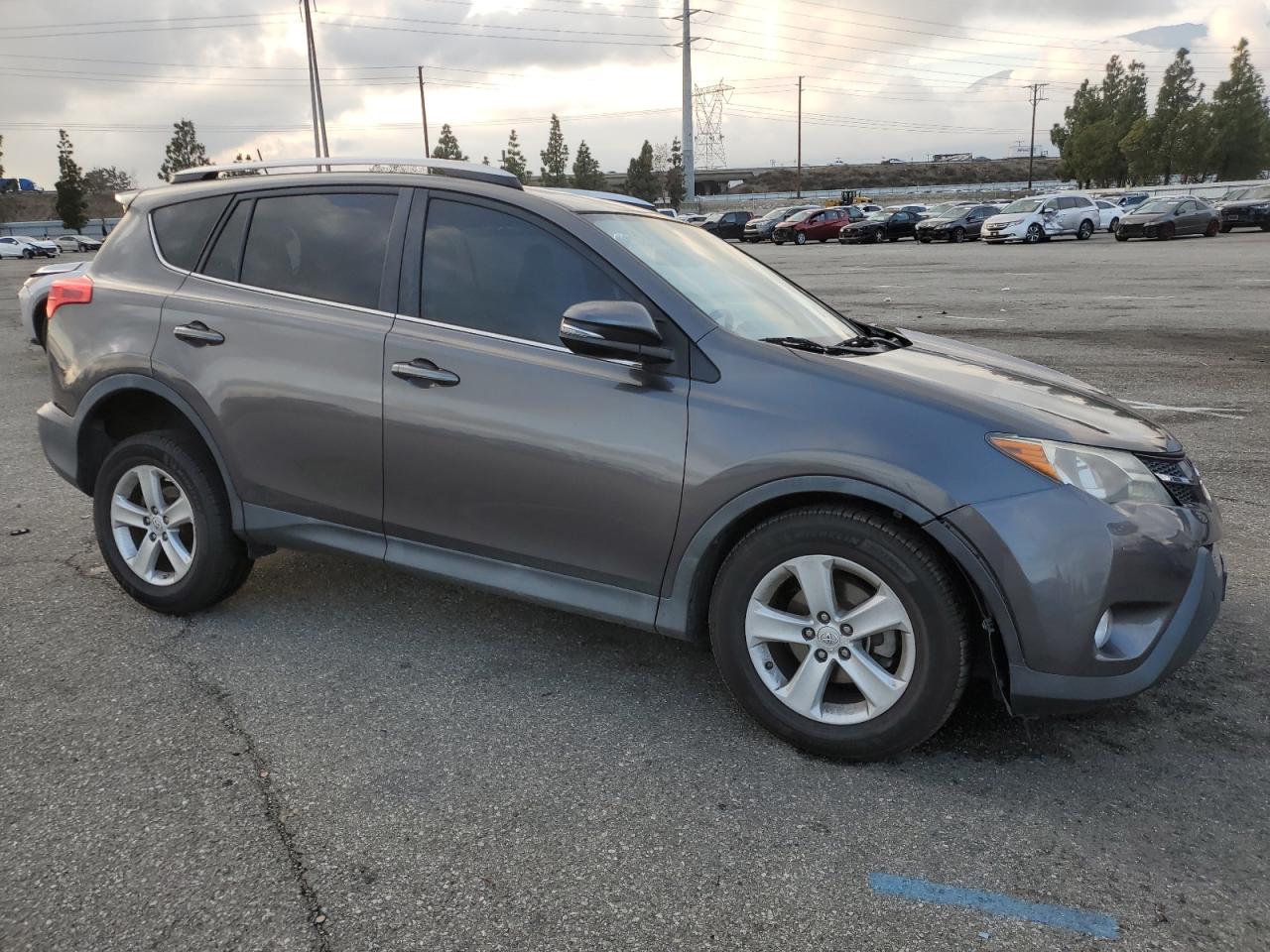2014 Toyota RAV 4 VIN 2T3WFREV0EW107022 Copart auction photo, front end / all over damage thumbnail 4