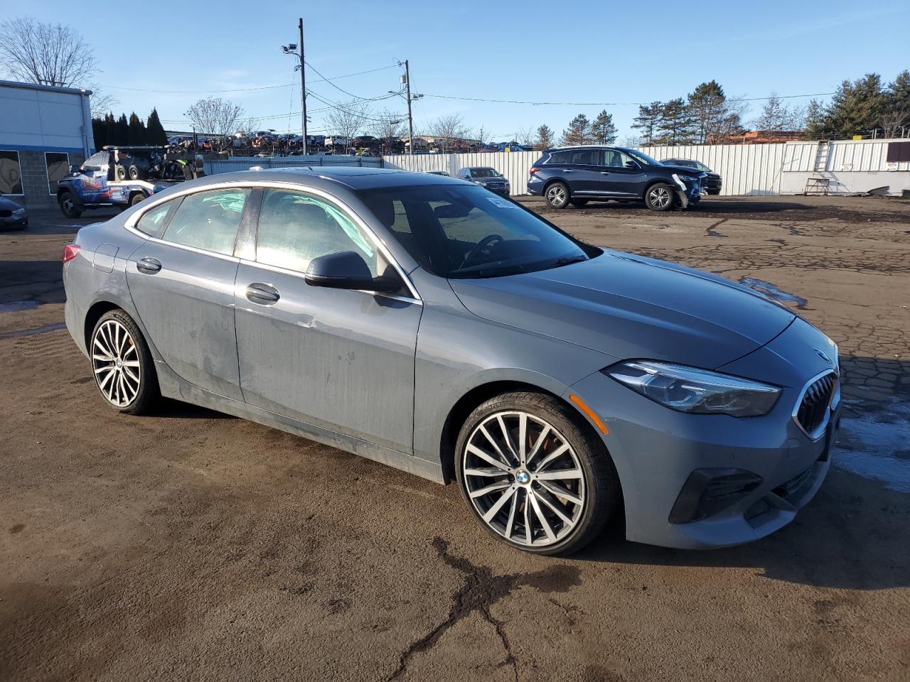 2022 BMW 2er VIN WBA73AK02N7K47993 Copart auction photo, undercarriage / minor dent/scratches damage thumbnail 4