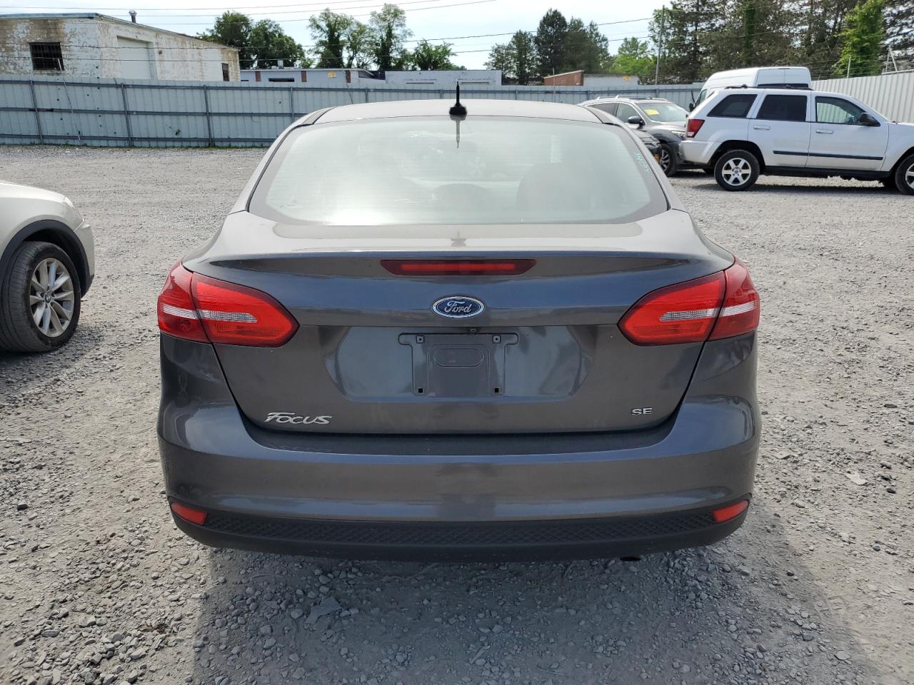2017 Ford Focus VIN 1FADP3F2XHL213934 Copart auction photo, side / minor dent/scratches damage thumbnail 6