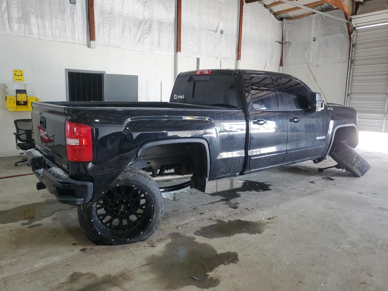 2018 GMC Sierra VIN 1GTV2MEC0JZ346587 Copart auction photo, undercarriage / rear end damage thumbnail 3