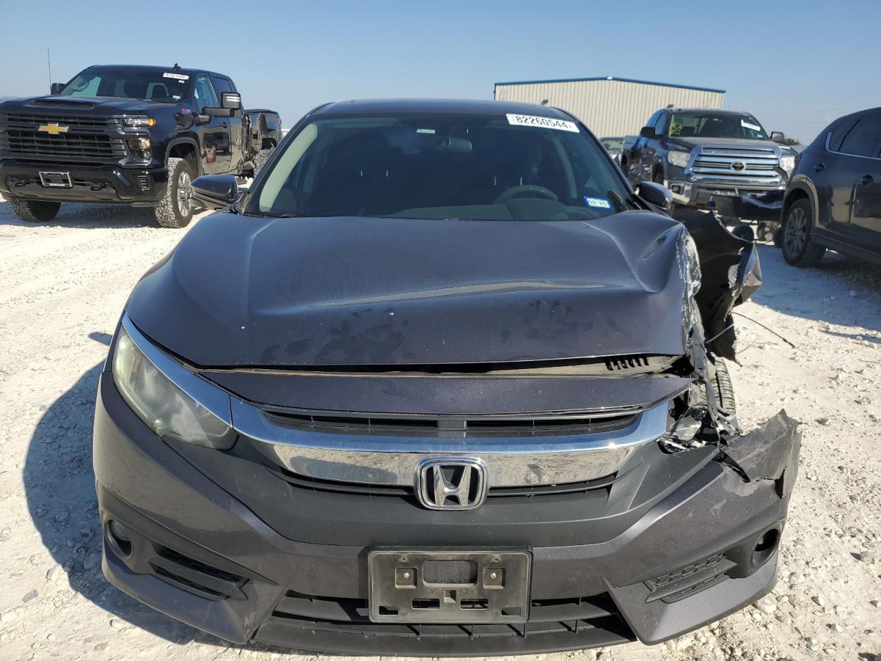 2016 Honda Civic VIN 2HGFC1F38GH642806 Copart auction photo, front end / side damage thumbnail 5
