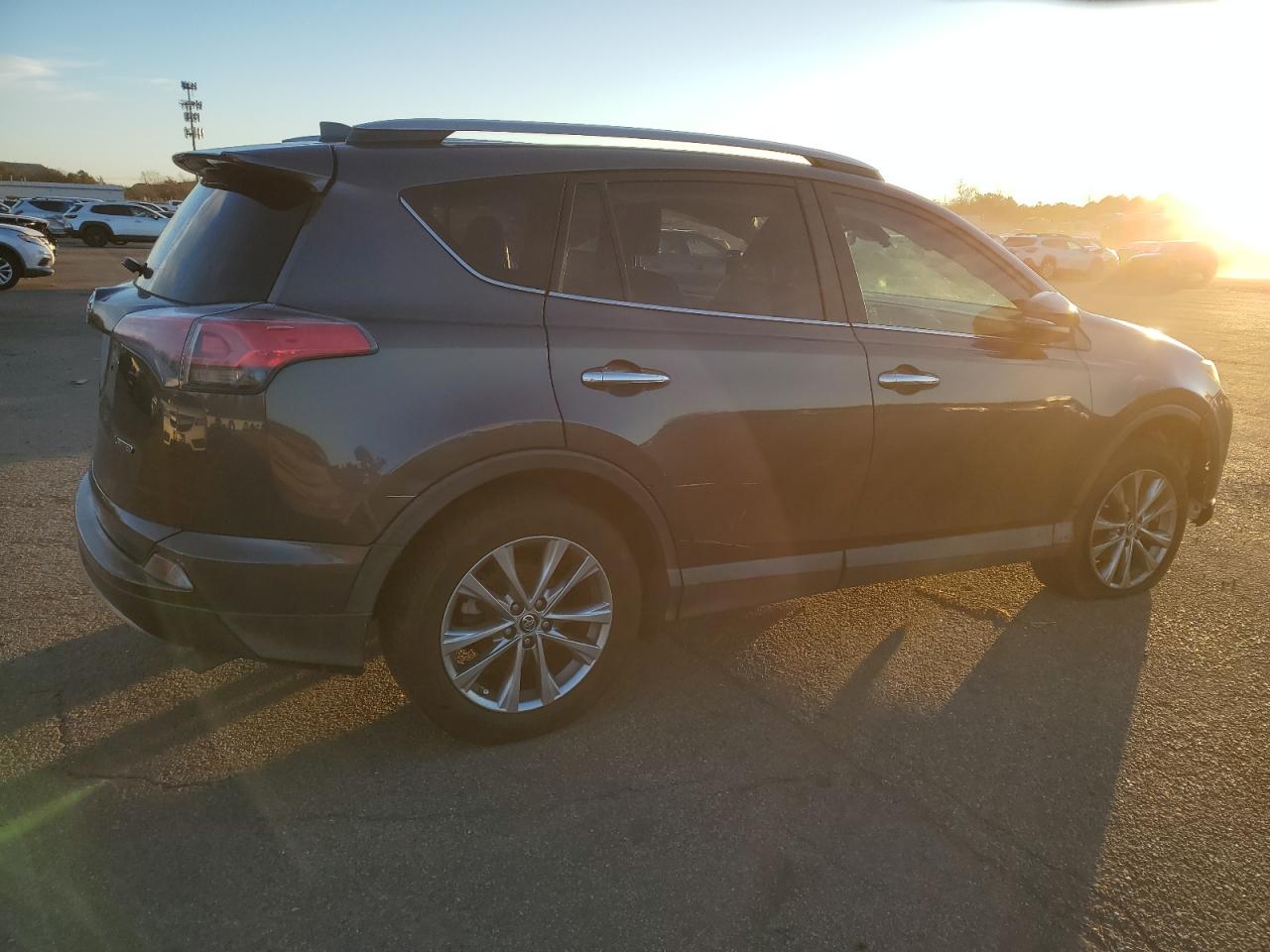 2017 Toyota RAV 4 VIN 2T3YFREV9HW350325 Copart auction photo, side / front end damage thumbnail 3