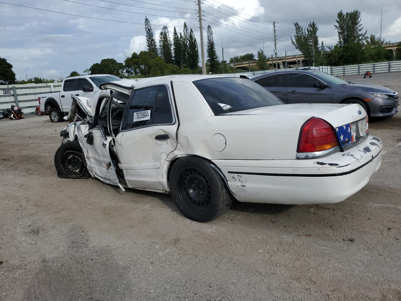 2000 Ford Crown Victoria VIN 2FAFP71W1YX197264 Copart auction photo, all over damage thumbnail 2