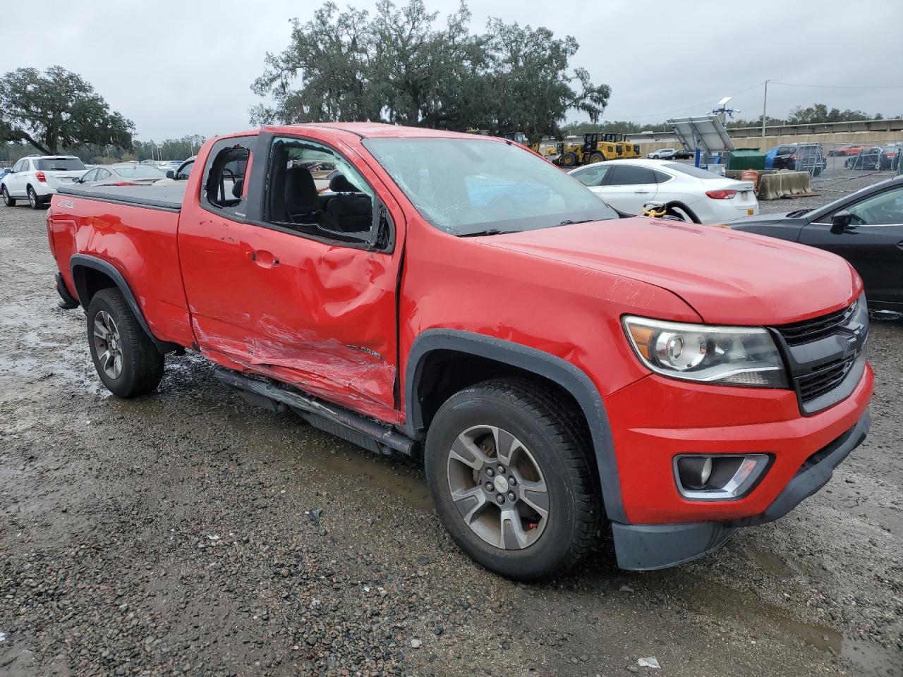 2015 Chevrolet Colorado VIN 1GCHTCE3XF1113438 Copart auction photo, rollover / side damage thumbnail 4