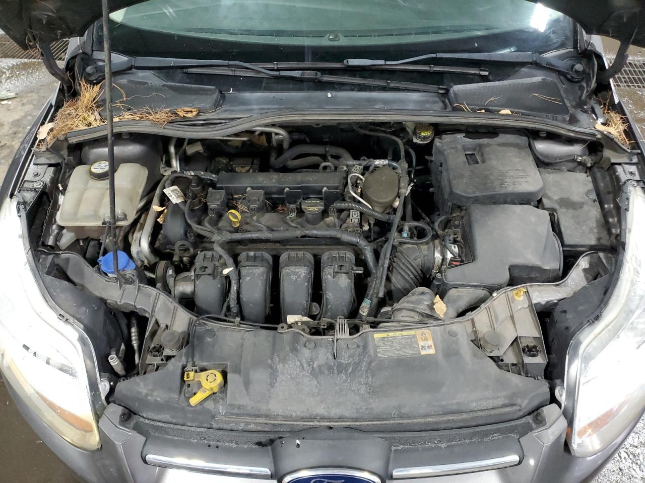 2012 Ford Focus VIN 1FAHP3F25CL237052 Copart auction photo, all over damage thumbnail 12