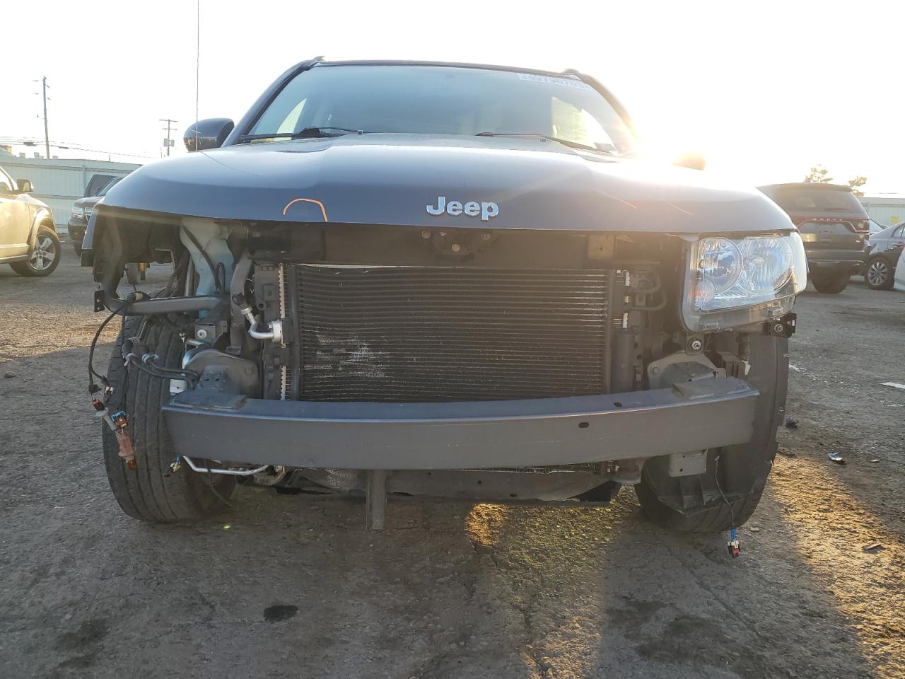 2016 Jeep Compass VIN 1C4NJDEB2GD744996 Copart auction photo, front end damage thumbnail 5