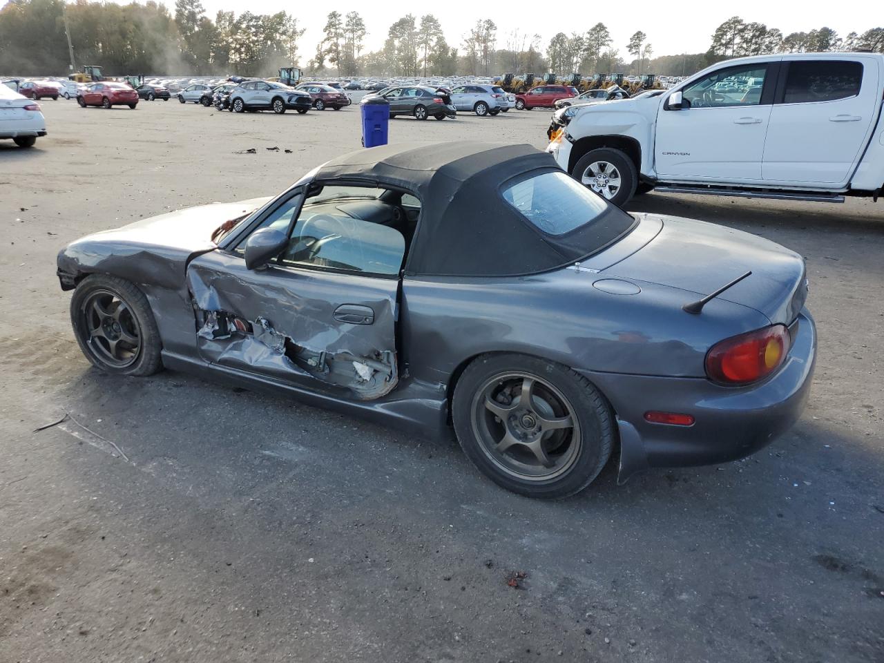 1999 Mazda MX-5 VIN JM1NB3535X0115739 Copart auction photo, front end / side damage thumbnail 2