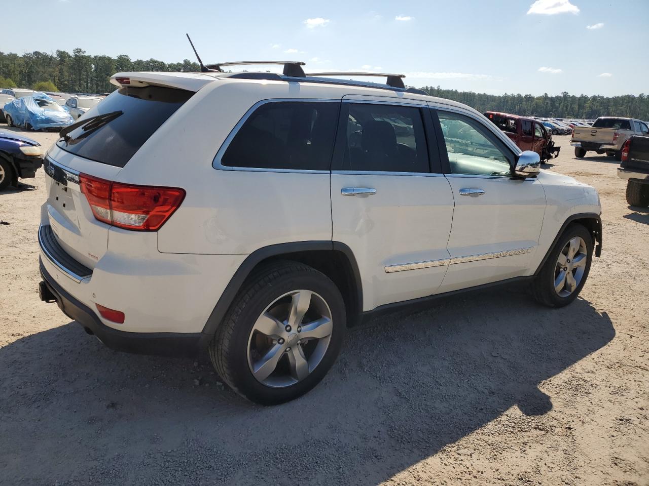 2012 Jeep Grand Cherokee VIN 1C4RJFCG8CC287705 Copart auction photo, front end damage thumbnail 3