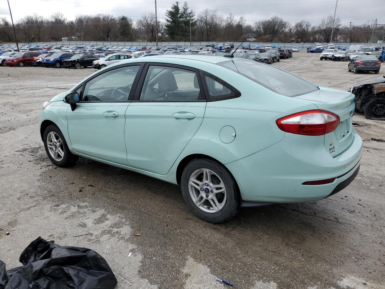 2018 Ford Fiesta VIN 3FADP4BJ8JM109773 Copart auction photo, front end / side damage thumbnail 2