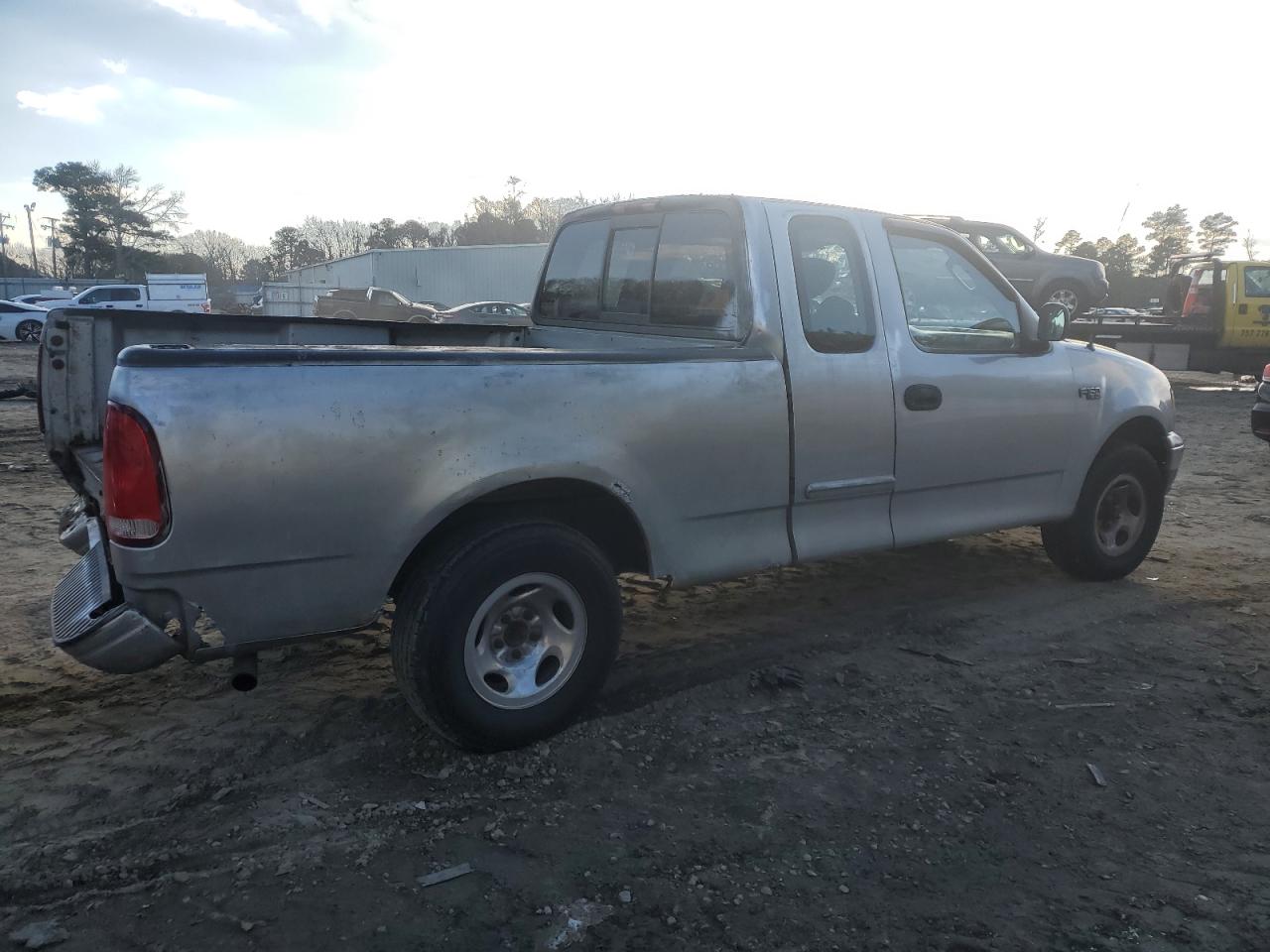 2003 Ford F-150 VIN 1FTRX17273NA68576 Copart auction photo, rear end / minor dent/scratches damage thumbnail 3