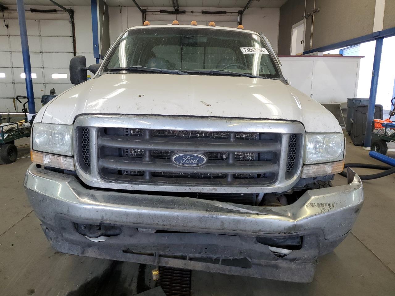 2004 Ford F350 VIN 1FTSW31P84EC75578 Copart auction photo, side / front end damage thumbnail 5