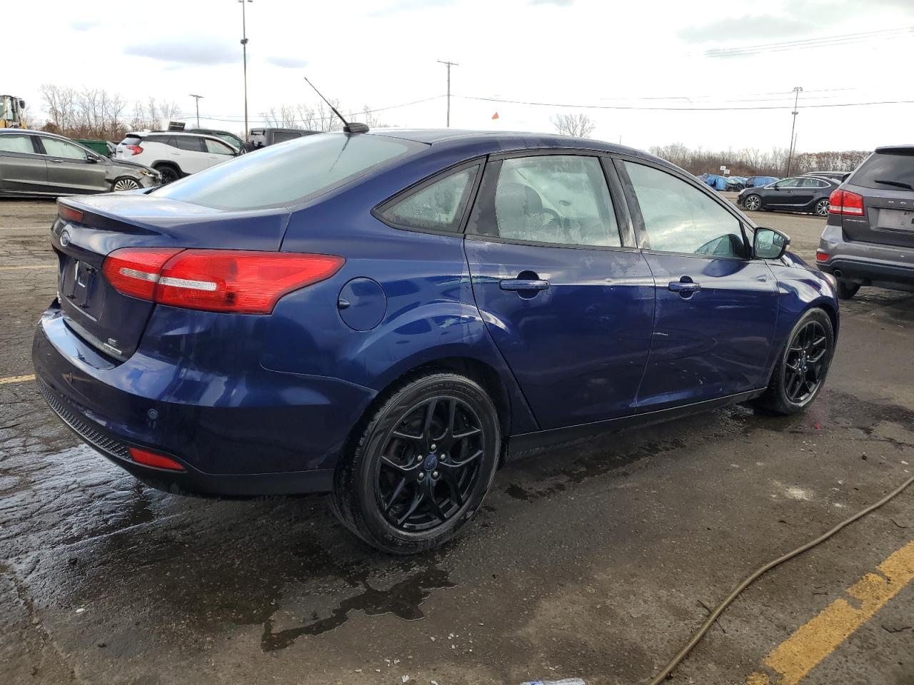 2016 Ford Focus VIN 1FADP3F27GL292915 Copart auction photo, rear end / minor dent/scratches damage thumbnail 3