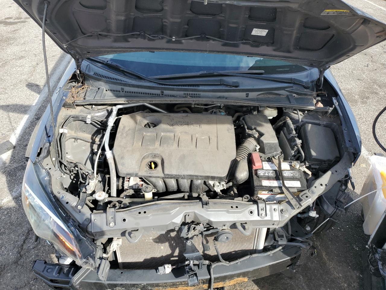 2018 Toyota Corolla VIN 5YFBURHE6JP799906 Copart auction photo, front end / side damage thumbnail 11