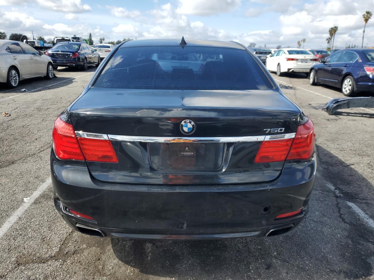 2012 BMW 7er VIN WBAKA8C57CDS99976 Copart auction photo, front end / minor dent/scratches damage thumbnail 6
