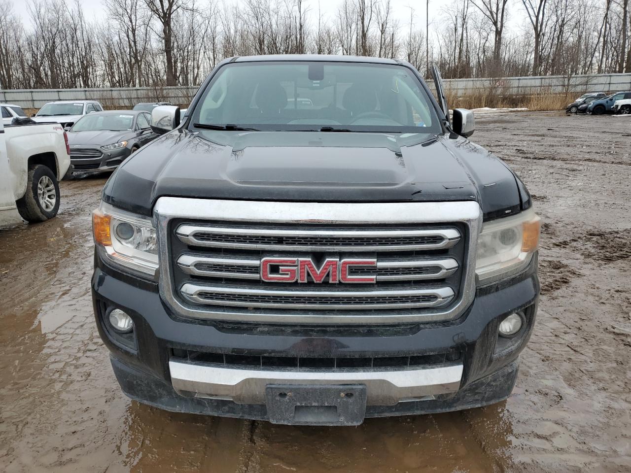 2015 GMC Canyon VIN 1GTG6CE36F1130143 Copart auction photo, side / rear end damage thumbnail 5
