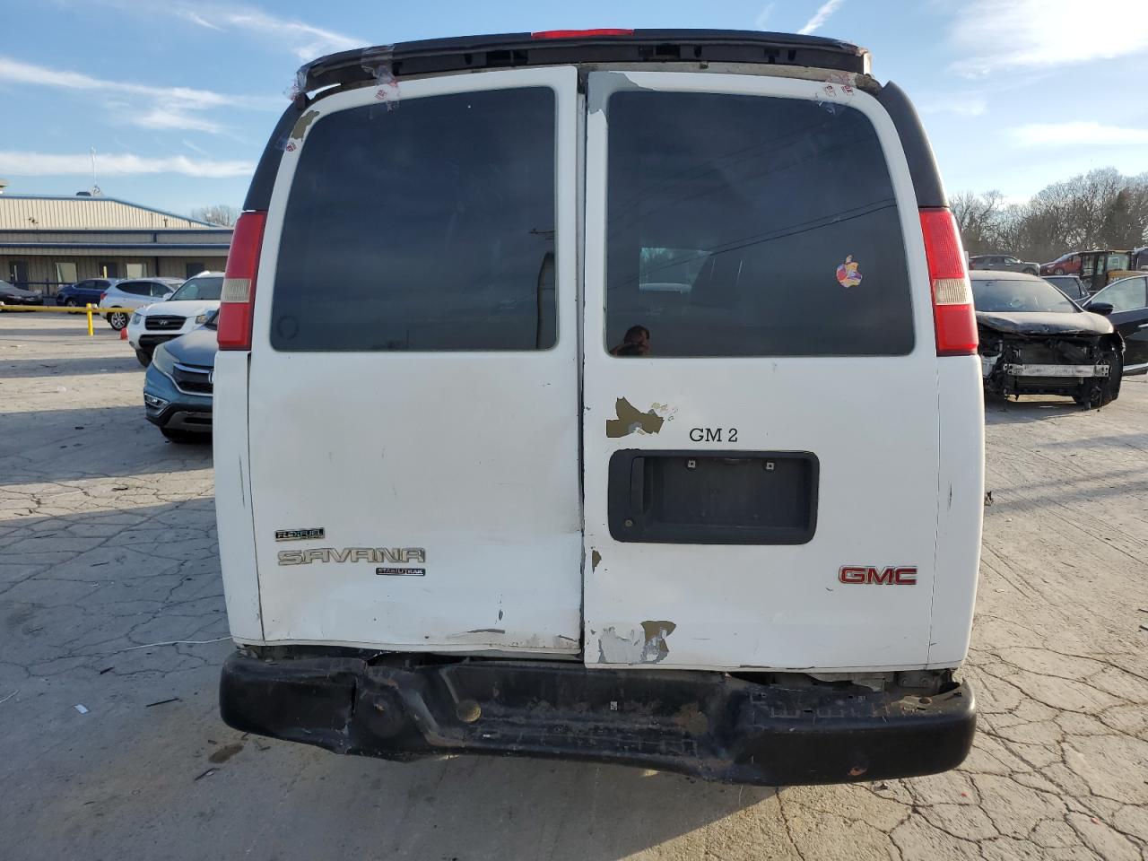 2011 GMC Savana VIN 1GTW7FCA0B1189792 Copart auction photo, rear end / side damage thumbnail 6