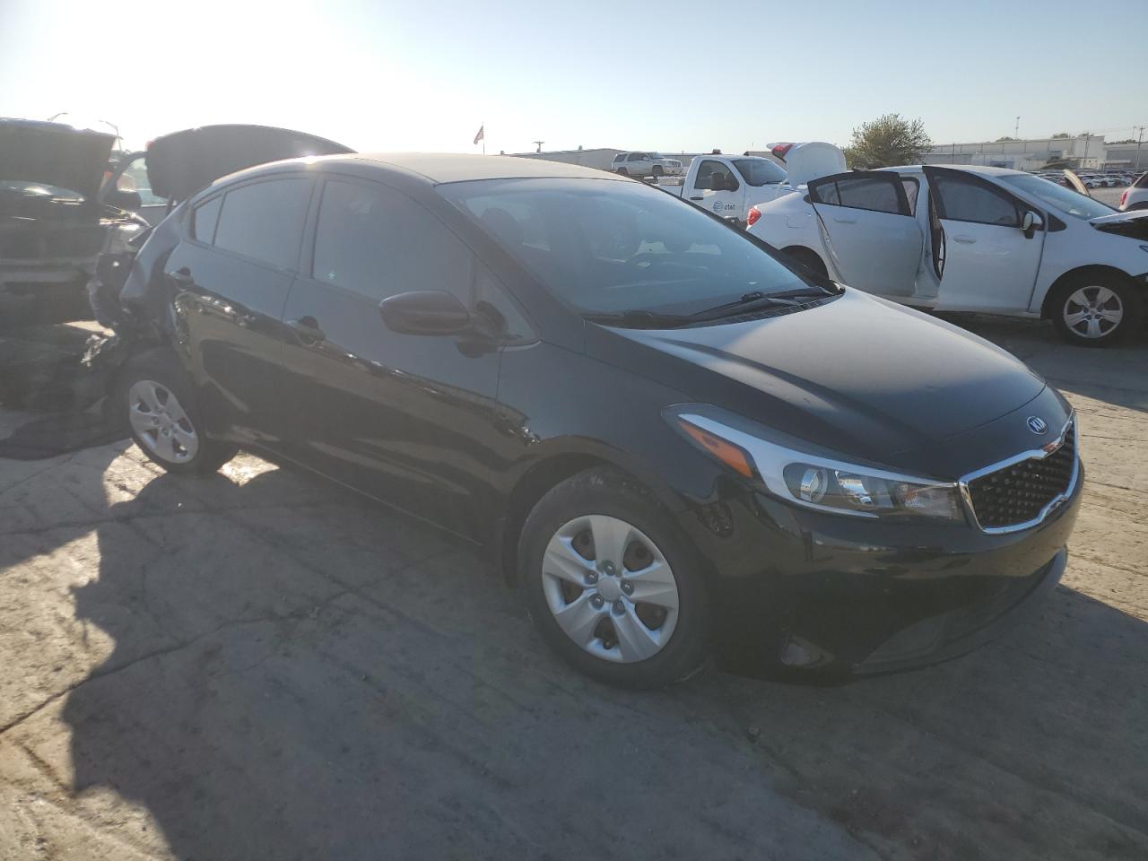 2018 KIA Forte VIN 3KPFK4A79JE163987 Copart auction photo, rear end / undercarriage damage thumbnail 4