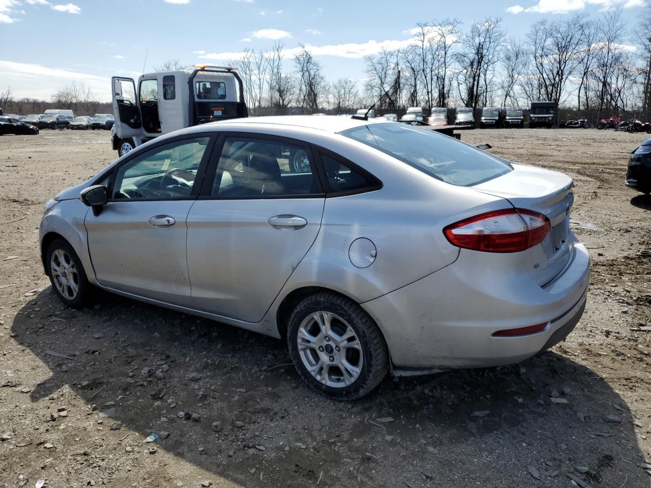 2016 Ford Fiesta VIN 3FADP4BJXGM174777 Copart auction photo, front end / undercarriage damage thumbnail 2